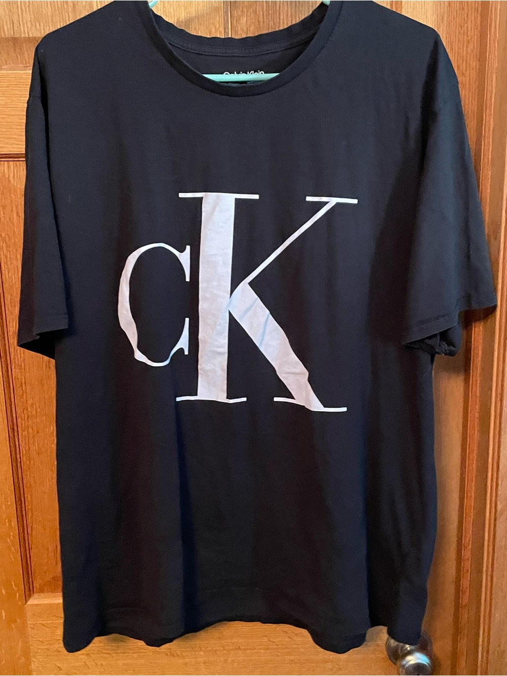 Calvin Klein Black Tee with Large White CK Logo